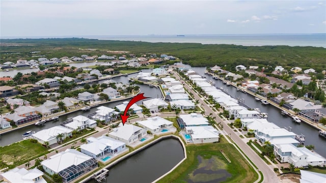 5713 Tybee Island Dr, Apollo Beach, FL 33572 - aerial overview of property's location featuring a large body of water and nearby suburban area