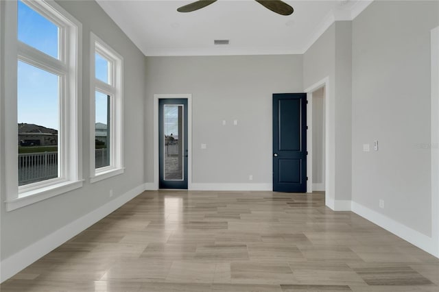 5713 Tybee Island Dr, Apollo Beach, FL 33572 - unfurnished room featuring crown molding, a ceiling fan, and baseboards