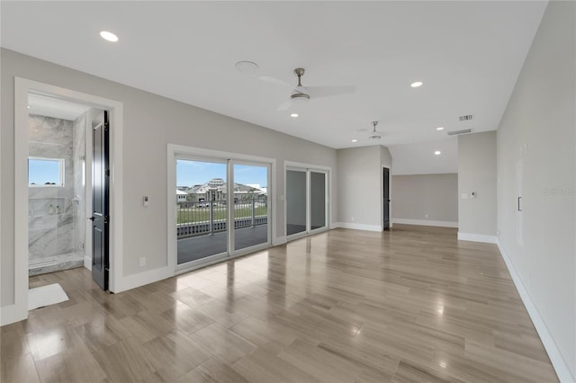 5713 Tybee Island Dr, Apollo Beach, FL 33572 - unfurnished room with healthy amount of natural light, ceiling fan, baseboards, recessed lighting, and light wood finished floors