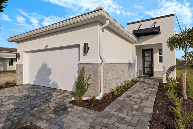 view of front of home featuring a garage