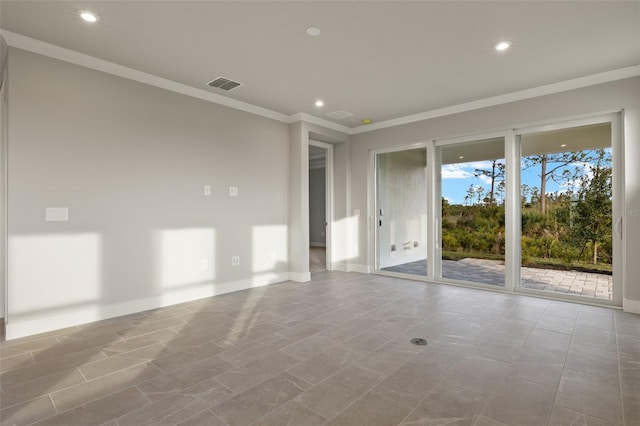 unfurnished room featuring ornamental molding