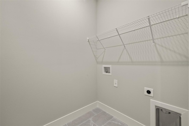 laundry area with hookup for a washing machine and hookup for an electric dryer