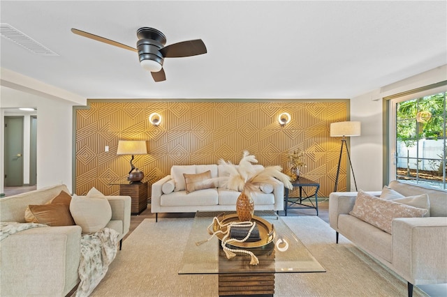 living room with ceiling fan