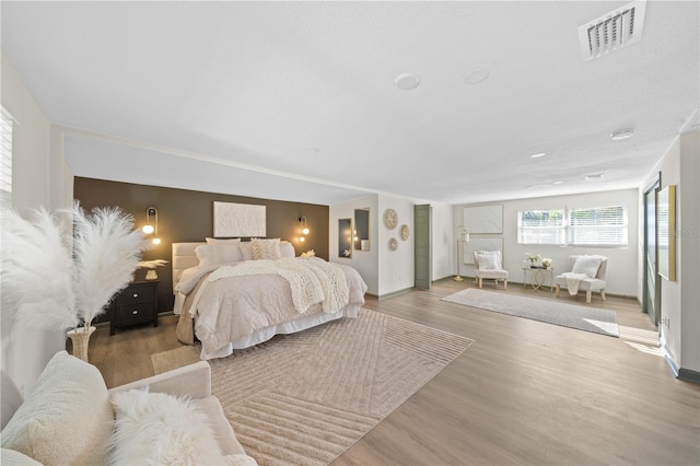 bedroom featuring wood-type flooring