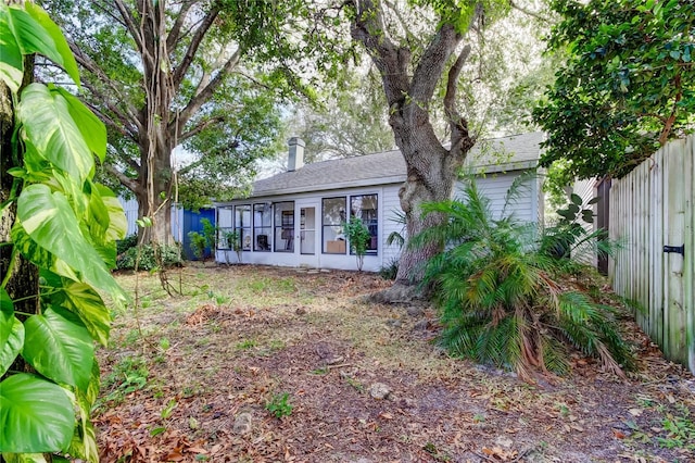 exterior space featuring a sunroom