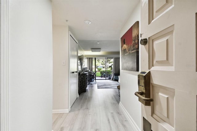 hallway featuring light hardwood / wood-style floors