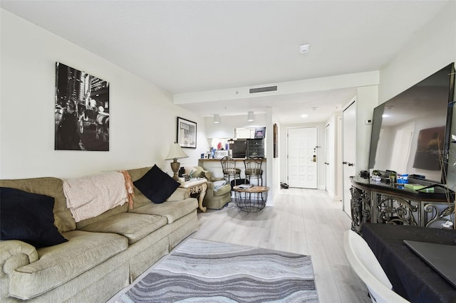 living room featuring light hardwood / wood-style floors