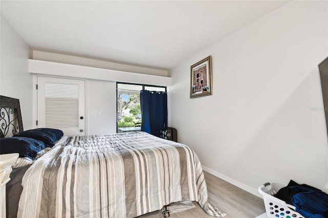 bedroom with light wood-type flooring