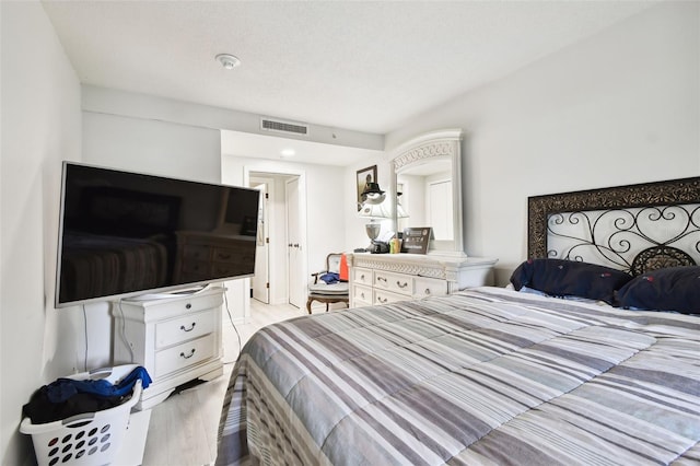 36750 US Highway 19 N Unit 01104, Palm Harbor, FL 34684 - bedroom with light wood-style flooring