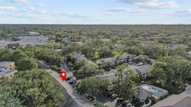 3034 Eastland Blvd Unit D108, Clearwater, FL 33761 - aerial overview of property's location with a heavily wooded area