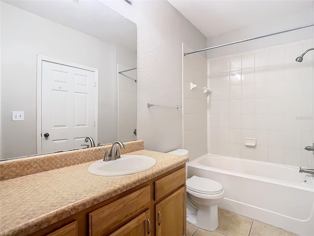 full bathroom with tile patterned flooring, vanity, toilet, and tiled shower / bath combo