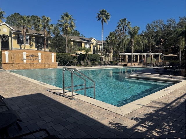 view of swimming pool with a patio area