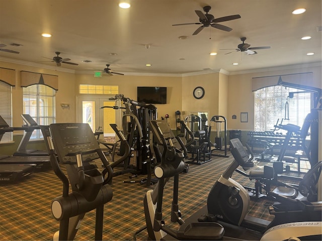 gym featuring carpet, crown molding, and french doors