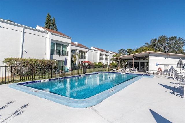 view of swimming pool featuring a patio area