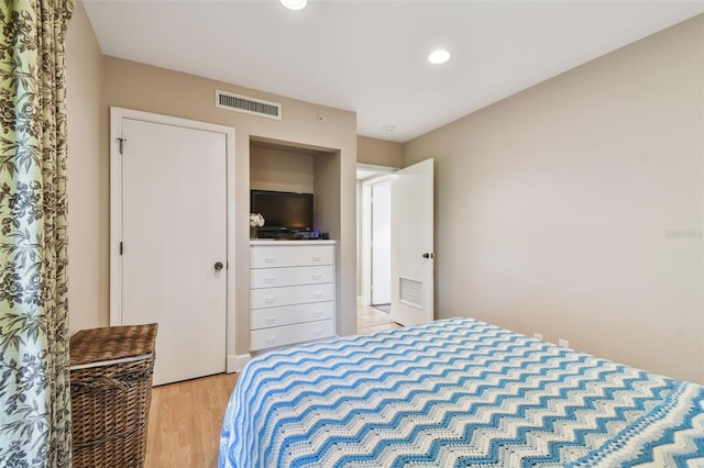 bedroom featuring light hardwood / wood-style floors