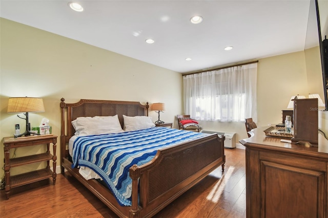 bedroom featuring hardwood / wood-style floors