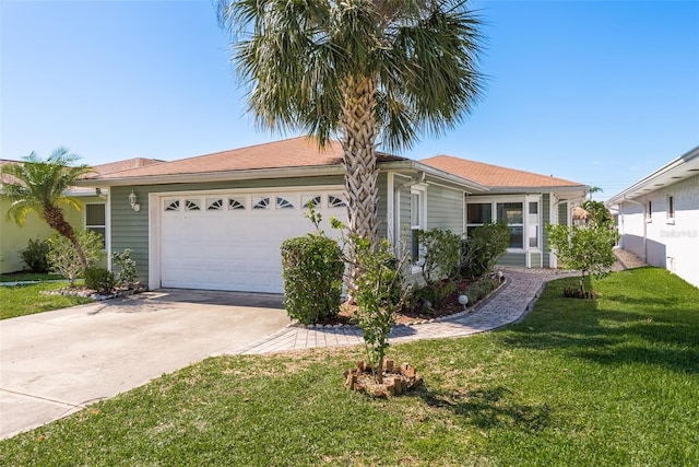 ranch-style home with a front lawn and a garage