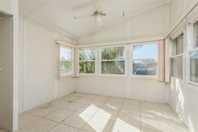 unfurnished sunroom featuring plenty of natural light, lofted ceiling, and ceiling fan