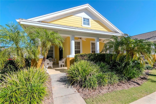 view of front of house with ceiling fan