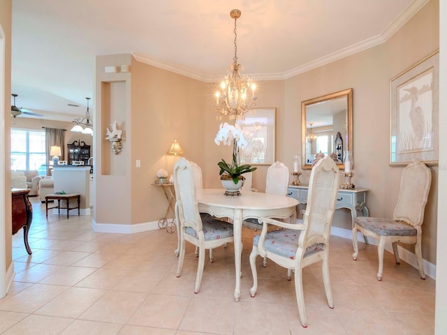 tiled dining space featuring crown molding and ceiling fan with notable chandelier