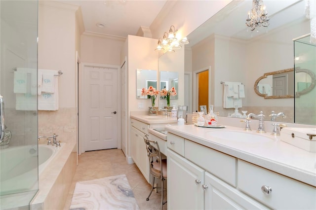 bathroom featuring ornamental molding, vanity, tiled tub, an inviting chandelier, and tile patterned flooring