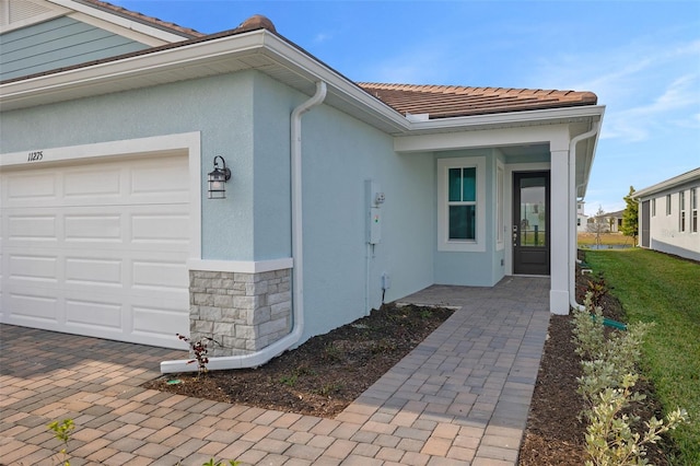 property entrance featuring a garage