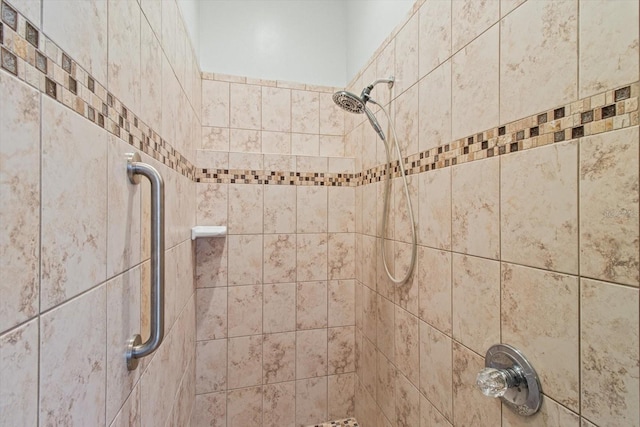 details featuring a tile shower