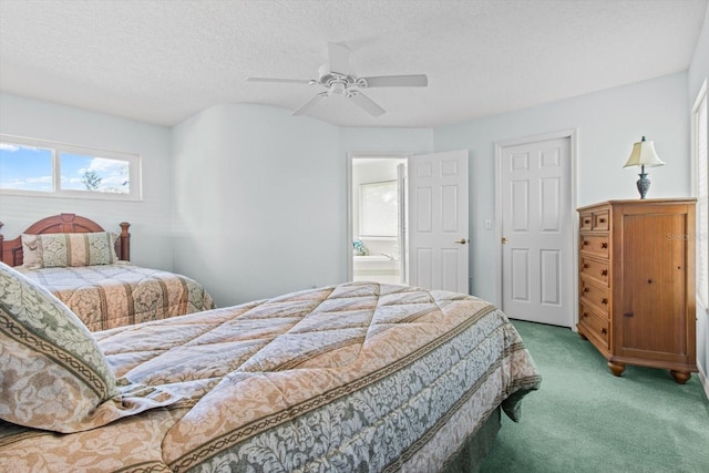 carpeted bedroom featuring a textured ceiling, ceiling fan, and connected bathroom