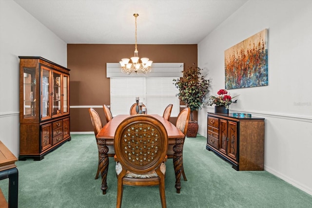 dining area with carpet and a chandelier