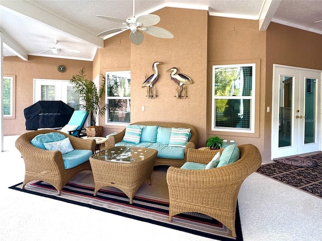 view of patio / terrace with ceiling fan and french doors