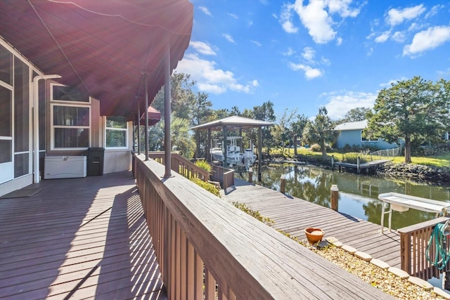 dock area with a water view