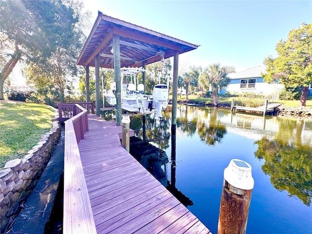 dock area featuring a water view