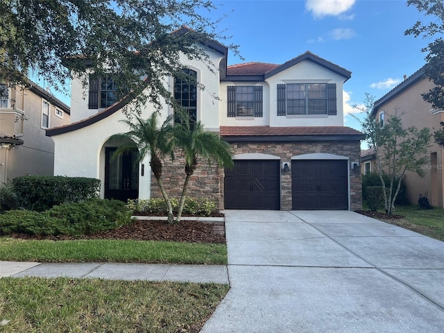 view of front of home with a garage