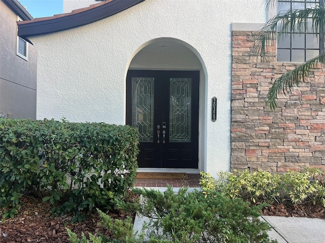 view of exterior entry with french doors