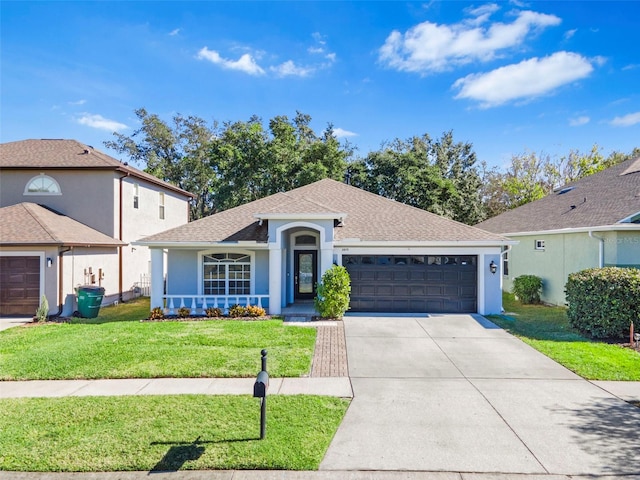 single story home featuring a front lawn, a porch, and a garage