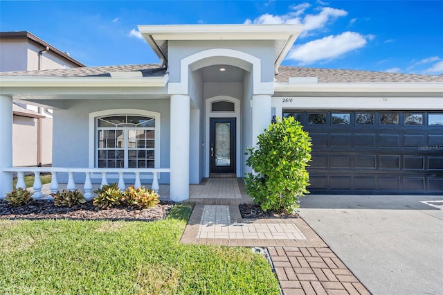 entrance to property featuring a garage