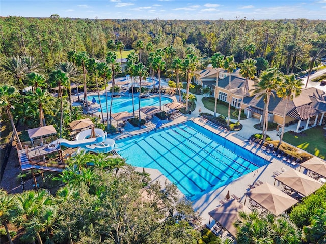 view of pool with a water slide