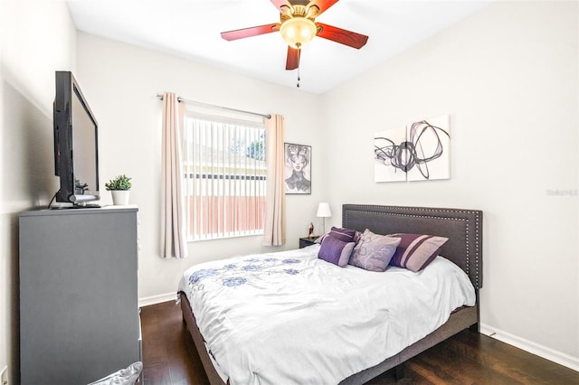 bedroom featuring dark hardwood / wood-style floors and ceiling fan