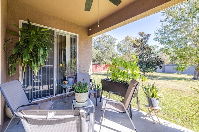 view of patio / terrace featuring ceiling fan