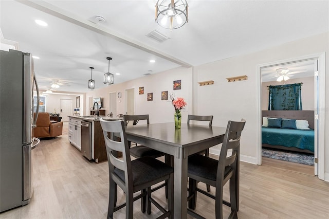 dining area with recessed lighting, a ceiling fan, visible vents, and light wood-style floors
