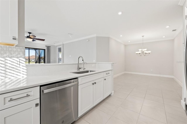 kitchen featuring white cabinets, ornamental molding, sink, decorative light fixtures, and dishwasher