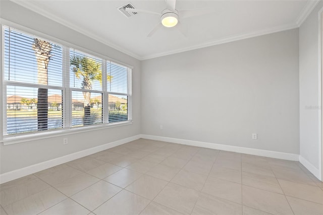 spare room with light tile patterned floors, ceiling fan, and ornamental molding