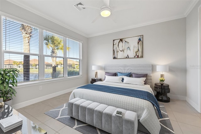 tiled bedroom featuring ceiling fan and crown molding