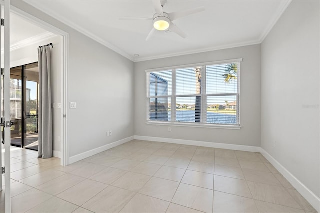 tiled spare room featuring ceiling fan and ornamental molding