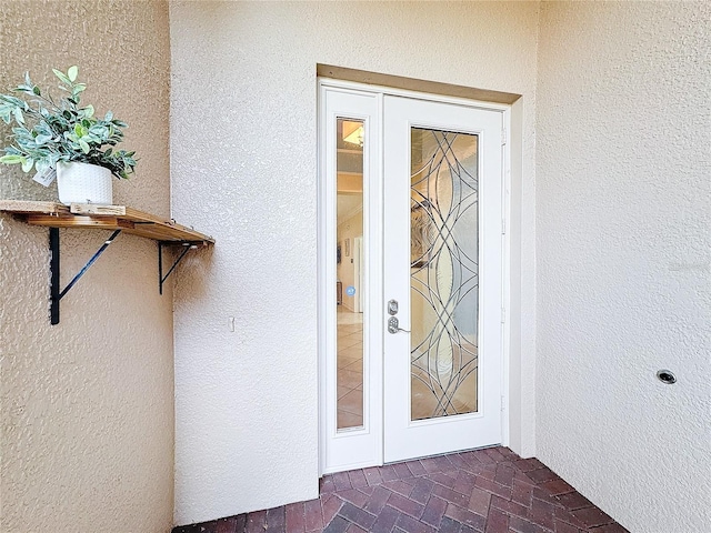 entrance to property with french doors