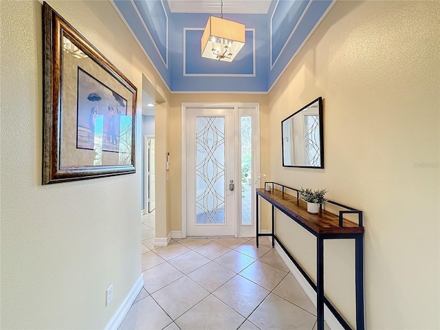 tiled entryway with crown molding