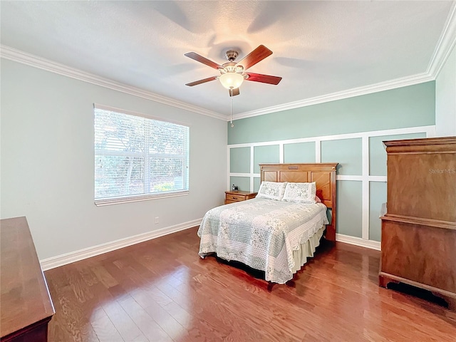 bedroom featuring ceiling fan, dark hardwood / wood-style flooring, crown molding, and a textured ceiling