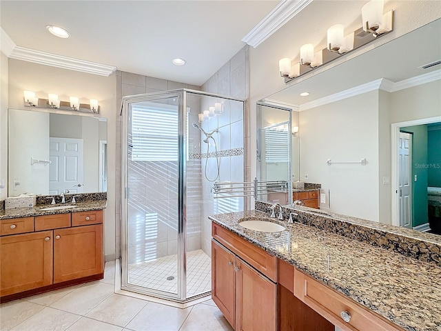 bathroom featuring tile patterned floors, crown molding, and walk in shower