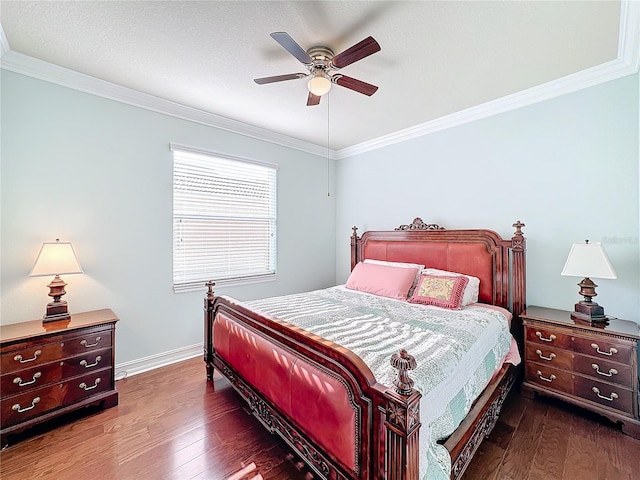 bedroom with ceiling fan, crown molding, and dark wood-type flooring