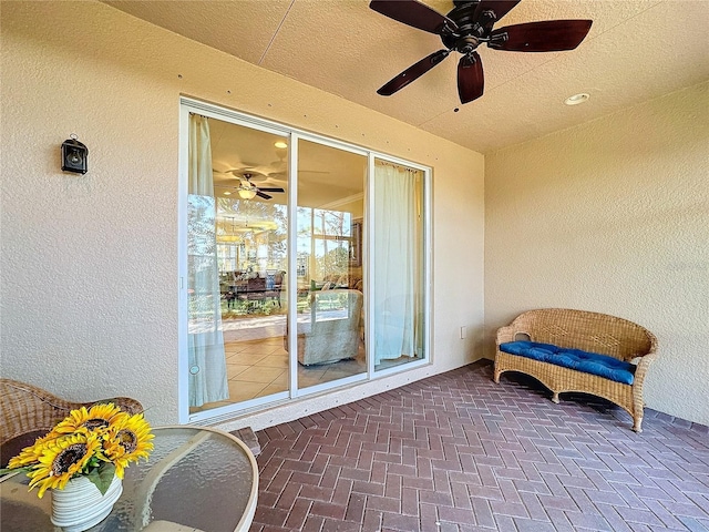 view of patio with ceiling fan